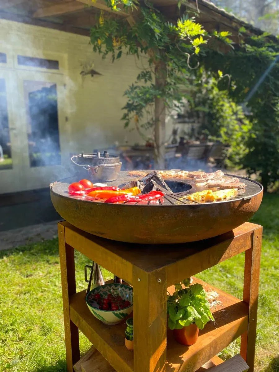 HEAT Bakka 80 cm Wood-Fired BBQ Fire Pit with Plancha Griddle and Log Store, Rusty Steel